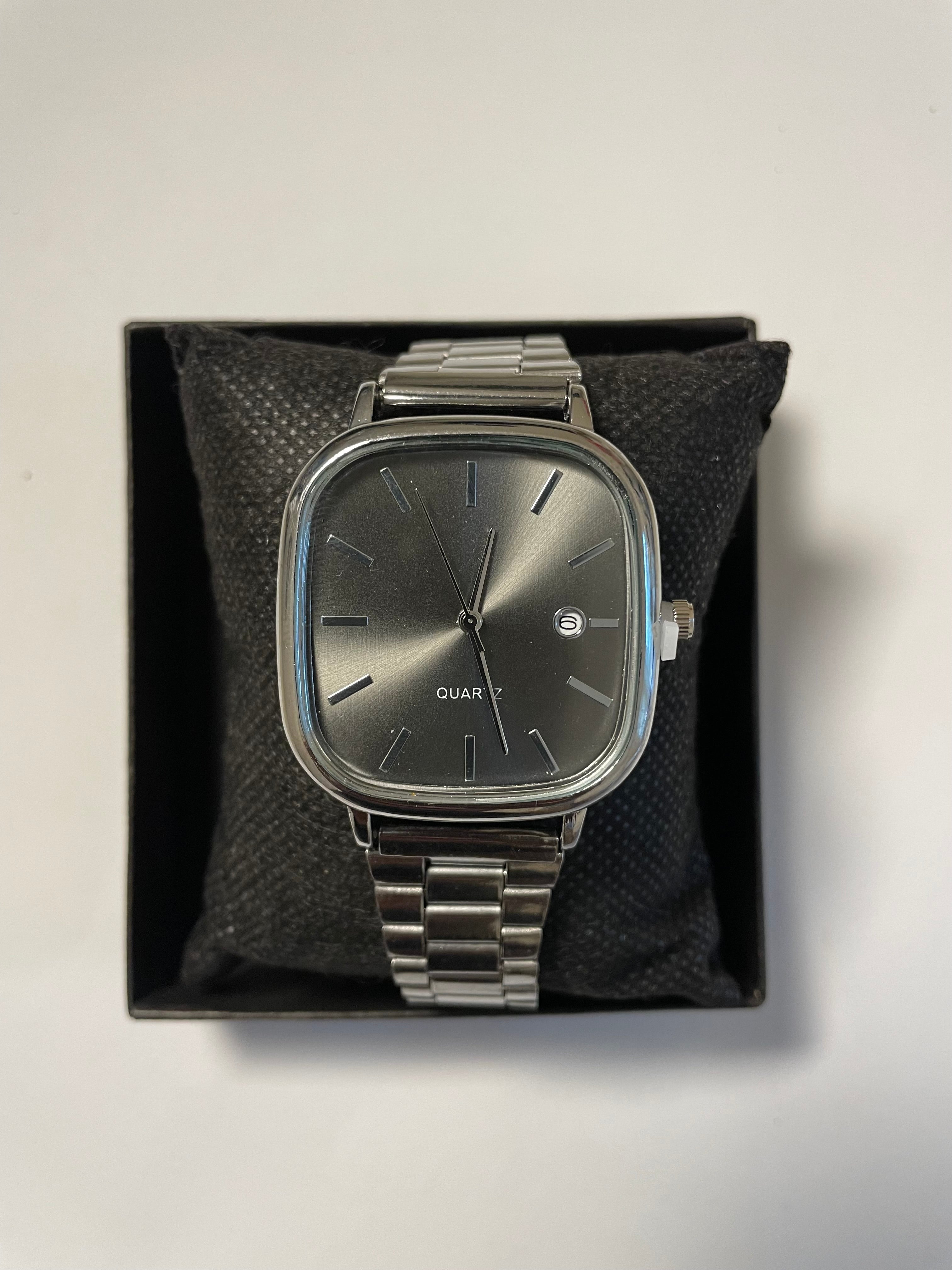 Black and silver watch with a sleek design