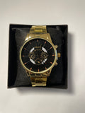 black and gold watch