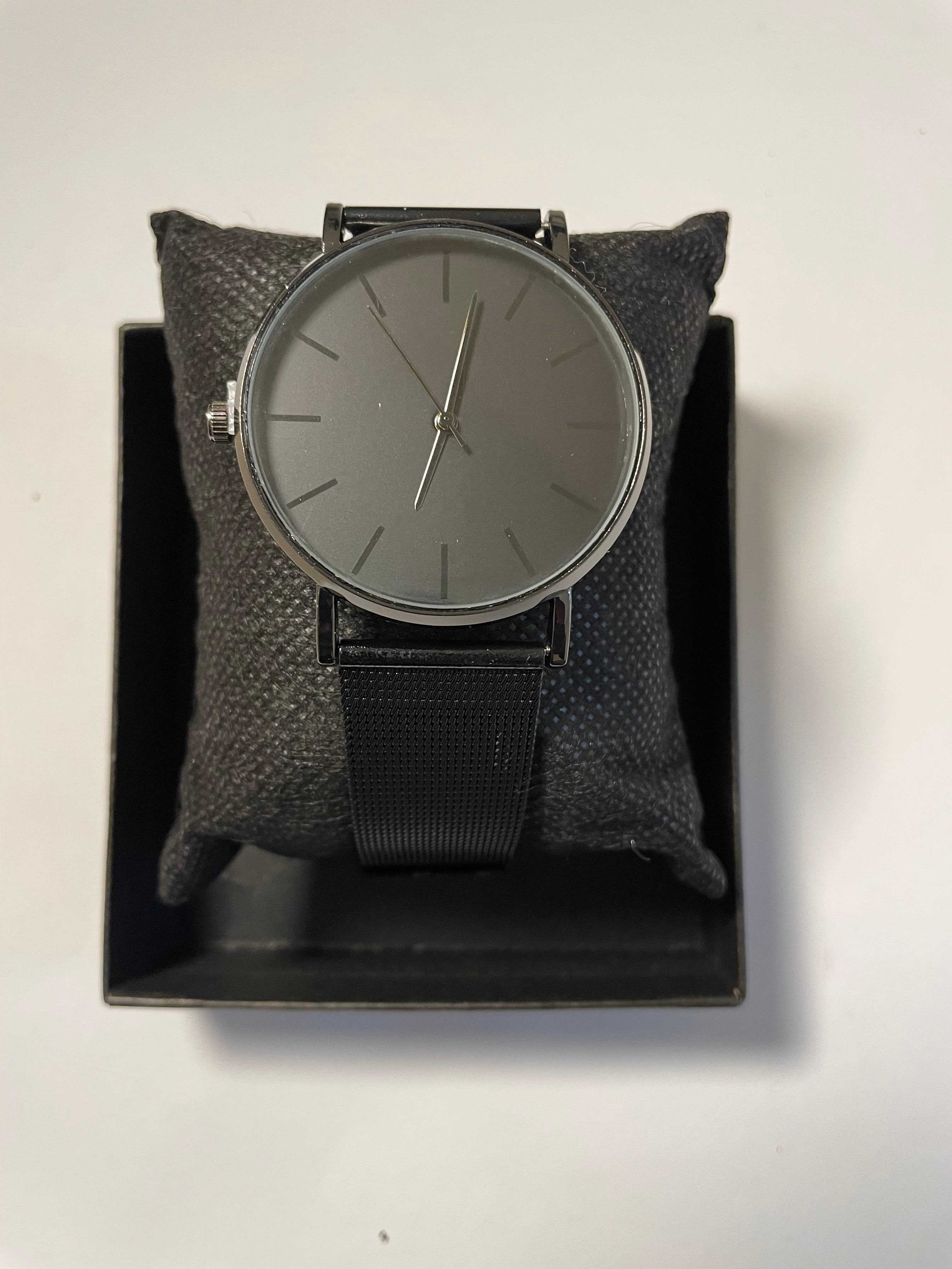 Black watch with a minimalist design