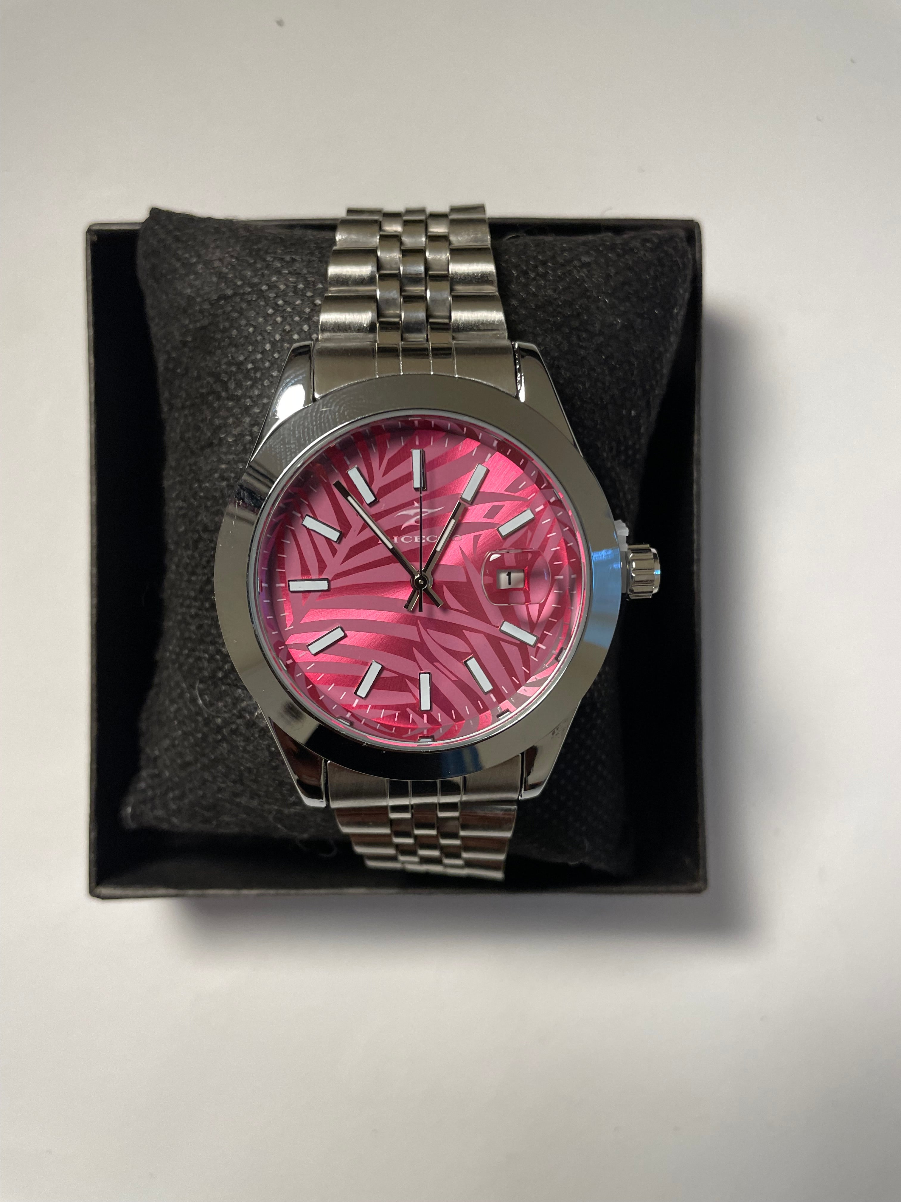 Pink and silver watch with zebra print